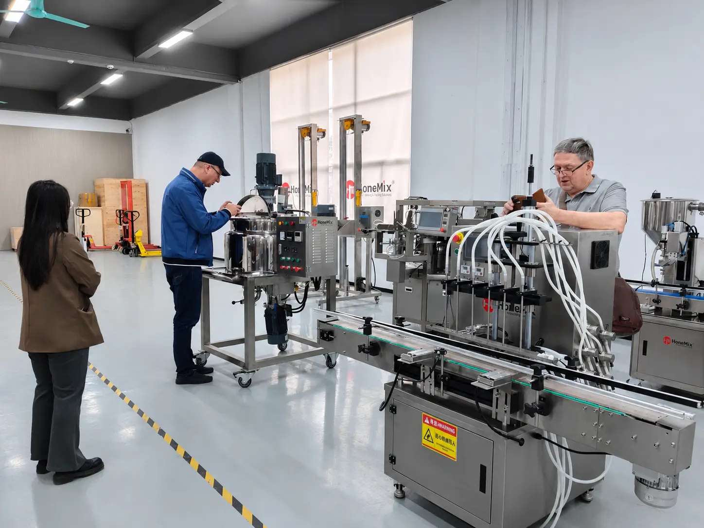 Polish Customer Factory Inspection of Cream Jar Filling Line Polish customer inspecting the automatic cream jar filling and capping line during factory testing