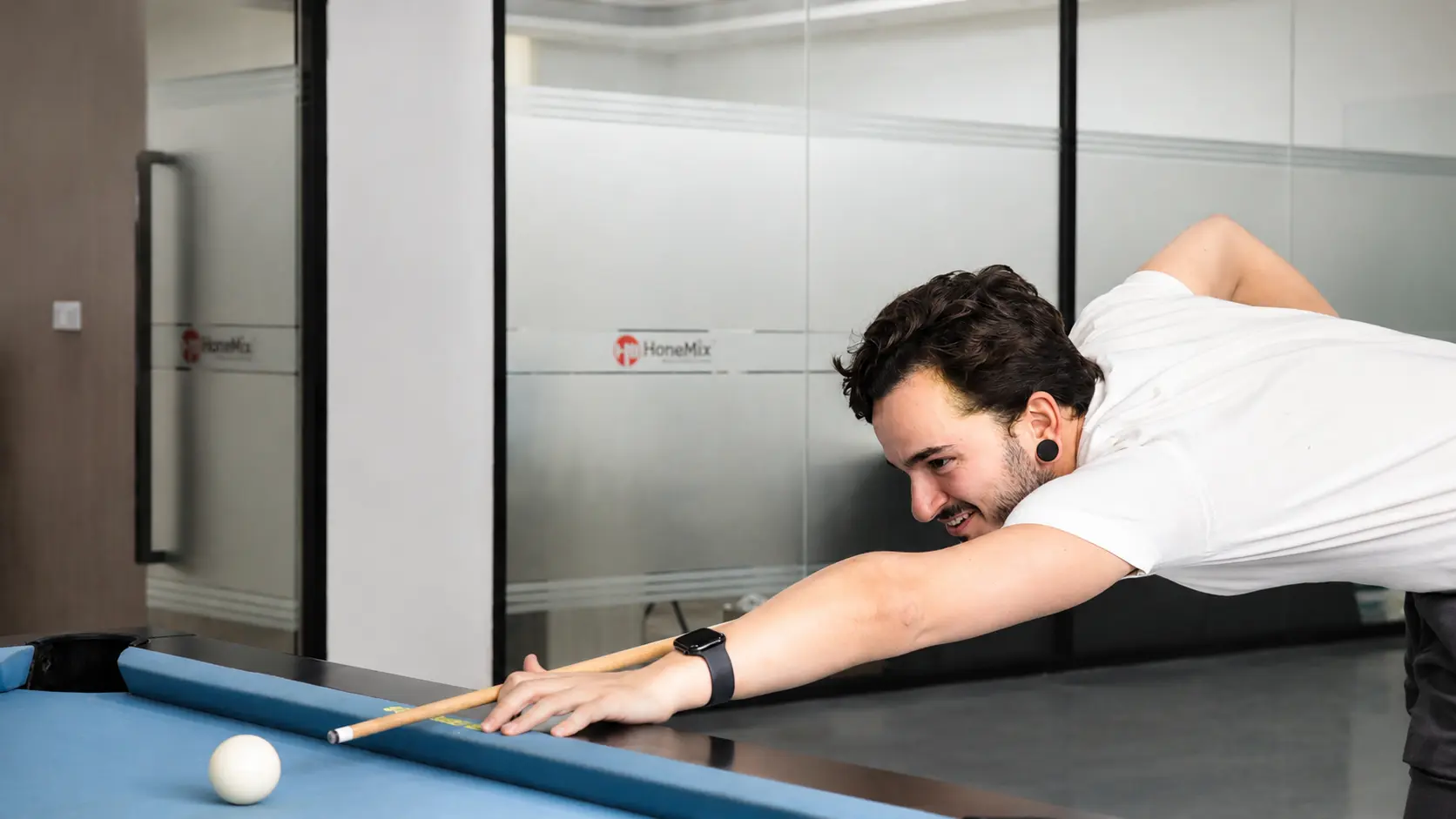 Spanish Customer Playing Billiards After Honemix Project Discussion Honemix-Team-And-Spanish-Customer-Relaxed-Billiards-Moment