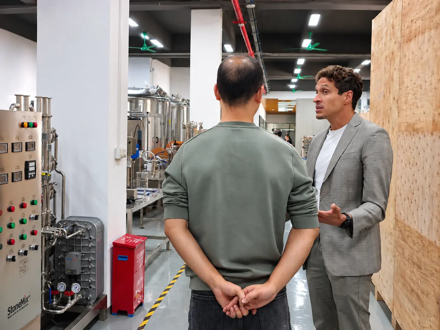 Customer Checking Perfume Filling Line Packing australian-customer-reviewing-perfume-filling-and-processing-equipment